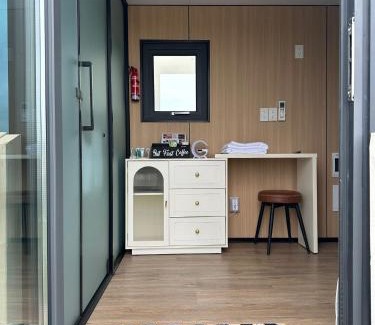 Muldoon Hotel | Flatonia Glamping Retreat - Musk Tiny House - Unique Container Cabin