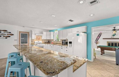 Upper Grand Lagoon House | Flirty Flamingo with Private Heated Pool, Game Room, and AMAZING Covered Outdoor Living