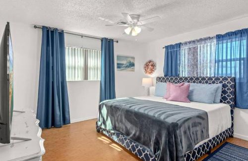 Upper Grand Lagoon House | Flirty Flamingo with Private Heated Pool, Game Room, and AMAZING Covered Outdoor Living