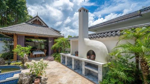 Tengchong House | Floral Hotel Tengchong Wuwenju B&B