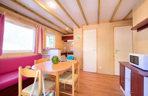 Saint-Hilaire-de-Riez Ski Chalet | Flower Camping Les Biches * - Chalet 2ch (without TV) - 24m2 - covered terrace 4 people