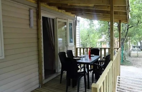 Banon House | Flower Camping le Epi Bleu * - Mobile home Comfort + 26m2 (2 bedrooms) + covered terrace 10m2 4 to 5 people - 4 pers. included in the tariff