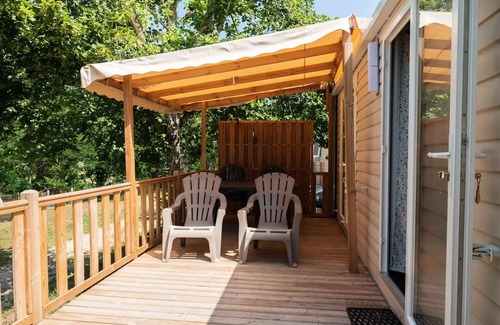 Les Ollieres-sur-Eyrieux House | Flower Camping Mas de Champel * - Mobile-Home 30m2 - Comfort - 2 bedrooms - Terrace semi-covered - TV - Clim 5 persons