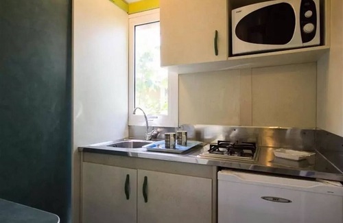 Saint Nazaire sur Charente Ski Chalet | Flower Camping L'Abri-Côtier * - Chalet 25m2 CONFORT - 2 bedrooms + covered terrace + TV 5 persons
