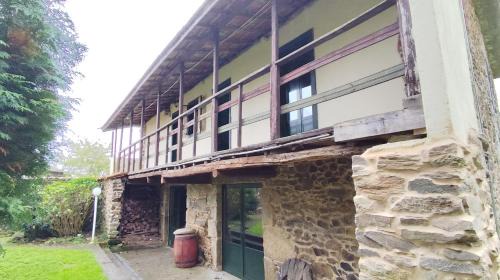 Cartelle House | Fonte dos pumares