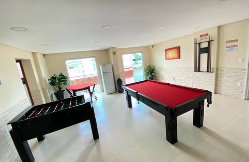 Maracana House | Foot in the sand at Maracanã beach