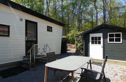 Marum Ski Chalet | Forest cottage for rent against forest