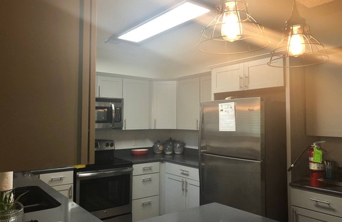 Mount Ida Condo | Forest view, log-sided two bedroom, two bath condo on Lake Ouachita. by RedAwning