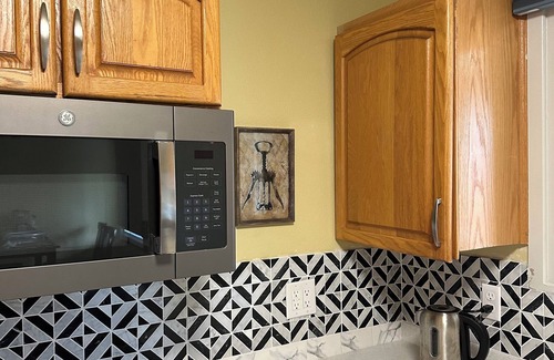 Taku - Campbell Apartment | Forget Me Not Home by Airport, upstairs unit of a 2 floor house