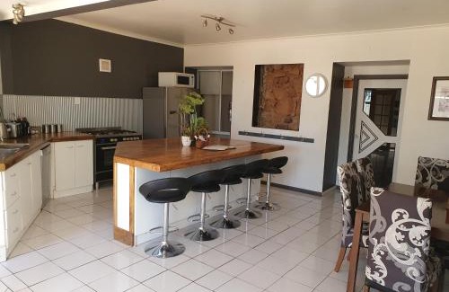 White Cliffs House | Fossickers Den Dugout Accommodation