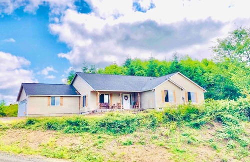 Raymond House | Four Bedroom Home with Hot Tub and Views