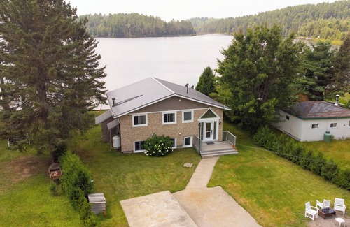 Sudbury District Cottage | Four Season Serene Lake House with Stunning Lake Views, Private Dock and Sauna.