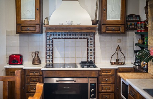 Saronikos Villa | Four Seasons Stonework Castle