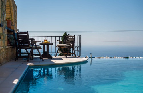 Saronikos Villa | Four Seasons Stonework Castle