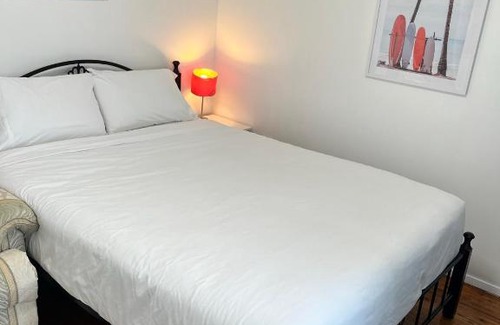 Doonside House | Fragrant Homes-68B independent aircon room, with 65’TV, queen size beds, rest sofa, built in wardrobe