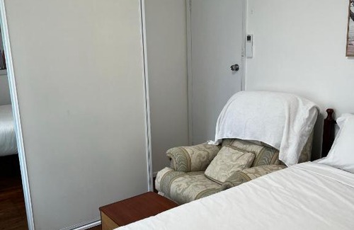 Doonside House | Fragrant Homes-68B independent aircon room, with 65’TV, queen size beds, rest sofa, built in wardrobe
