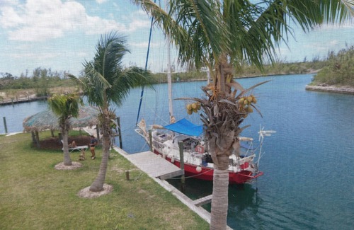 Bell Channel Bay Apartment | Free boat docks, 10 Bedroom, 10 Bath, Canal Front And Short Walk To Taino Beach