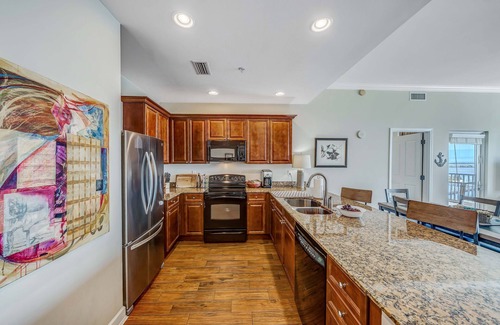 Upper Grand Lagoon Condo | FREE Daily Golf! Reflections 805 Amazing Top Floor View, Resort Pool, Hot Tub