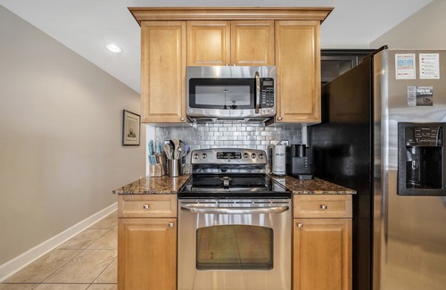 Upper Grand Lagoon Condo | FREE Daily Golf! Reflections 207 Bayfront Condo, Heated Resort Pool & Hot Tub