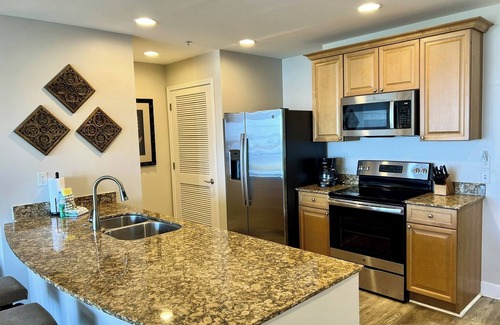 Upper Grand Lagoon Condo | FREE Daily Golf! Reflections 506 Amazing Views, Heated Resort Pool & Hot Tub!