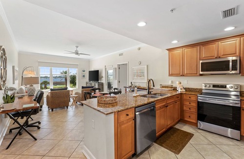 Upper Grand Lagoon Condo | FREE Golf & Tix! Reflections 304, 2 King Beds, Heated Resort Pool & Hot Tub!