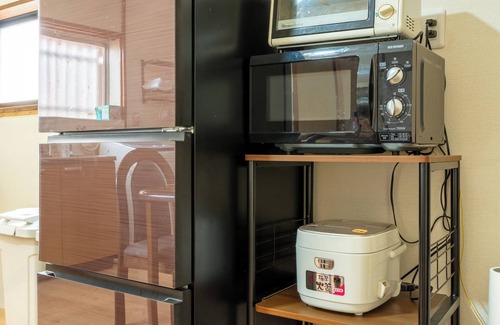 Nara House | Free parking and bicycles at "Yamato no Yado Minamibukuro", a 2-story old private house for rent in its entirety, capacity 11 people.