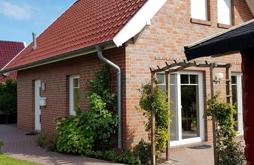 Neßmersiel House | free-standing, new built holiday house with exclusive furniture