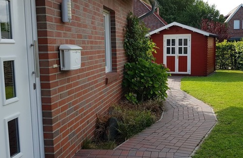 Neßmersiel House | free-standing, new built holiday house with exclusive furniture