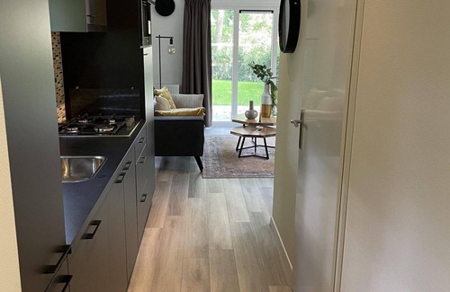 Terwolde House | Freestanding chalet for four persons, fully furnished. Located at the water.