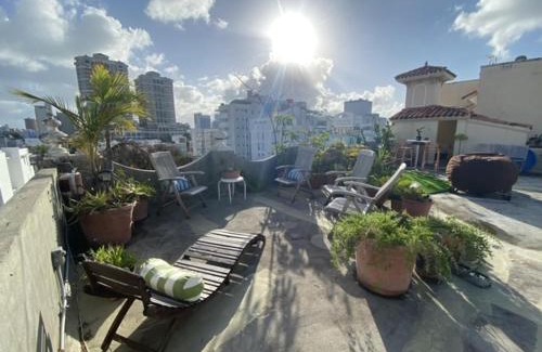 Parque Apartment | Fresh Tropical Colonial Style Walk-Up- Rooftop Terrace- Beach View