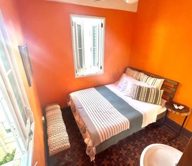 Parque Apartment | Fresh Tropical Colonial Style Walk-Up- Rooftop Terrace- Beach View