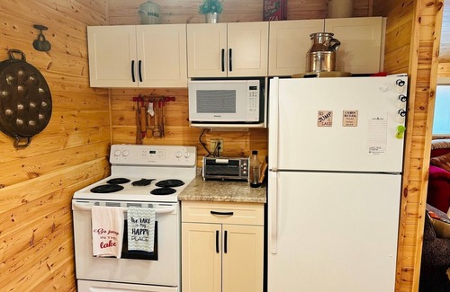 Minnedosa Cabin | Front row cabin, steps away from Minnedosa Beach, sleeps 6