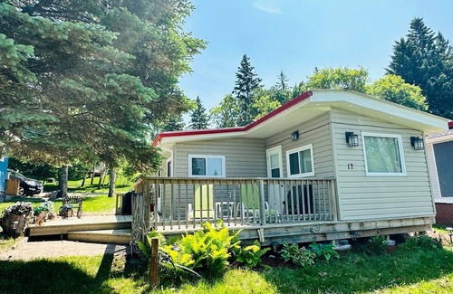 Minnedosa Cabin | Front row cabin, steps away from Minnedosa Beach, sleeps 6