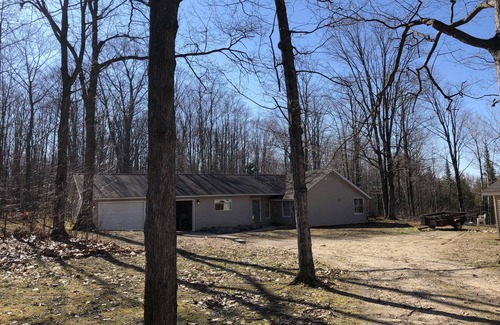 Carp Lake House | Full Home Rental on Paradise Lake. 2 Acres/60 ft of Lakefront & Private Dock