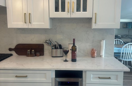 Mystic Island House | Fully upgraded home with gourmet kitchen waterfront outdoor oasis lanai,