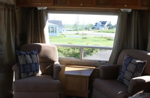 Mavillette House | Fully equipped camper on Mavillette River. Close to the beach. (pet friendly)