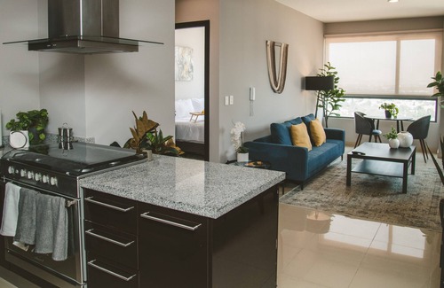 Ampliacion Granada Apartment | Fully equipped kitchen, high speed internet, comfy king-size bed and a sofa bed.