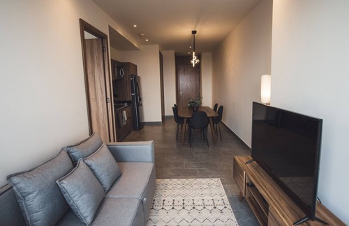 Cuauhtemoc Apartment | Fully equipped kitchen, high speed internet, comfy king-size bed and a small sofa bed.