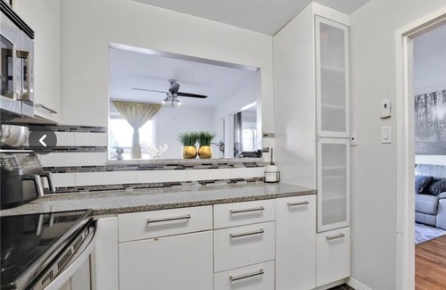 Ottawa Division Condo | Fully furnished bedroom in a cozy, modular home.