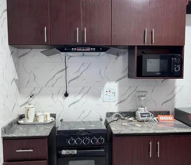Owerri Apartment | FULLY FURNISHED DAILY FLAT RENTALS AND APARTMENT RENTAL AT IPAM SELF SERVICE 2BEDROOM And 1 BED APARTMENT IN NEW OWERRI IMO STATE, WITH FREE SHUTLE PICK UP WITHIN OWERRI, kitchen and all living amenities included a home away from home, better than a hotel