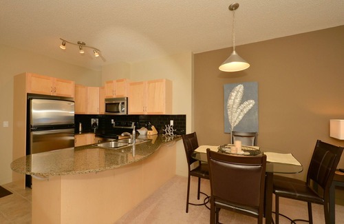 Lake Bonavista Condo | Fully Furnished Executive Suite Close to Transit and Amenities