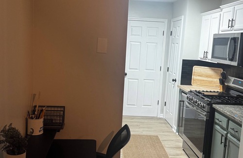 Church Street House | Fully Furnished Modern Home Patio with BBQ Grill for Relaxed Outdoor Living
