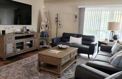 Garden Isles House | FULLY REMODELED HOME WITH PRIVATE HEATED/CHILLED POOL, WATER SLIDE, POOL TABLE
