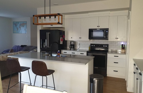 Grande Prairie House | fully stocked kitchen and pet friendly.