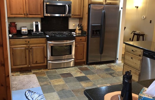 Indian River House | Fully updated lake front home on Sturgeon Bay, Burt Lake.