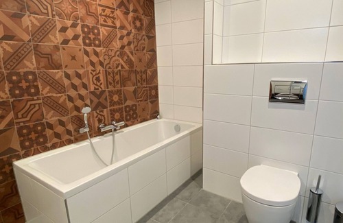 Emmen Hotel | Fun Filled Getaway | Steps from Rensenpark & Emmen's Museum of Tibetan Art