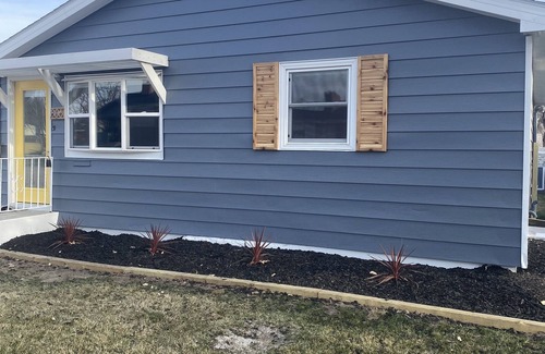 Ogallala House | Fun MidMod home remodeled with private back yard.