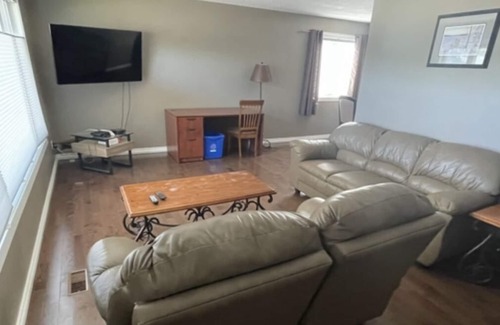 Kindersley House | Furnished 4 bedroom home in Kindersley
