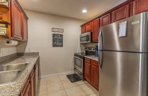 Biloxi Condo | Furnished beachfront condo near Keesler. Wifi included. Cypress Cove 213