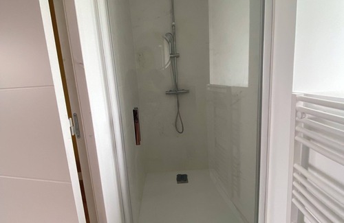 Langouet House | Furnished room with en-suite shower and toilet